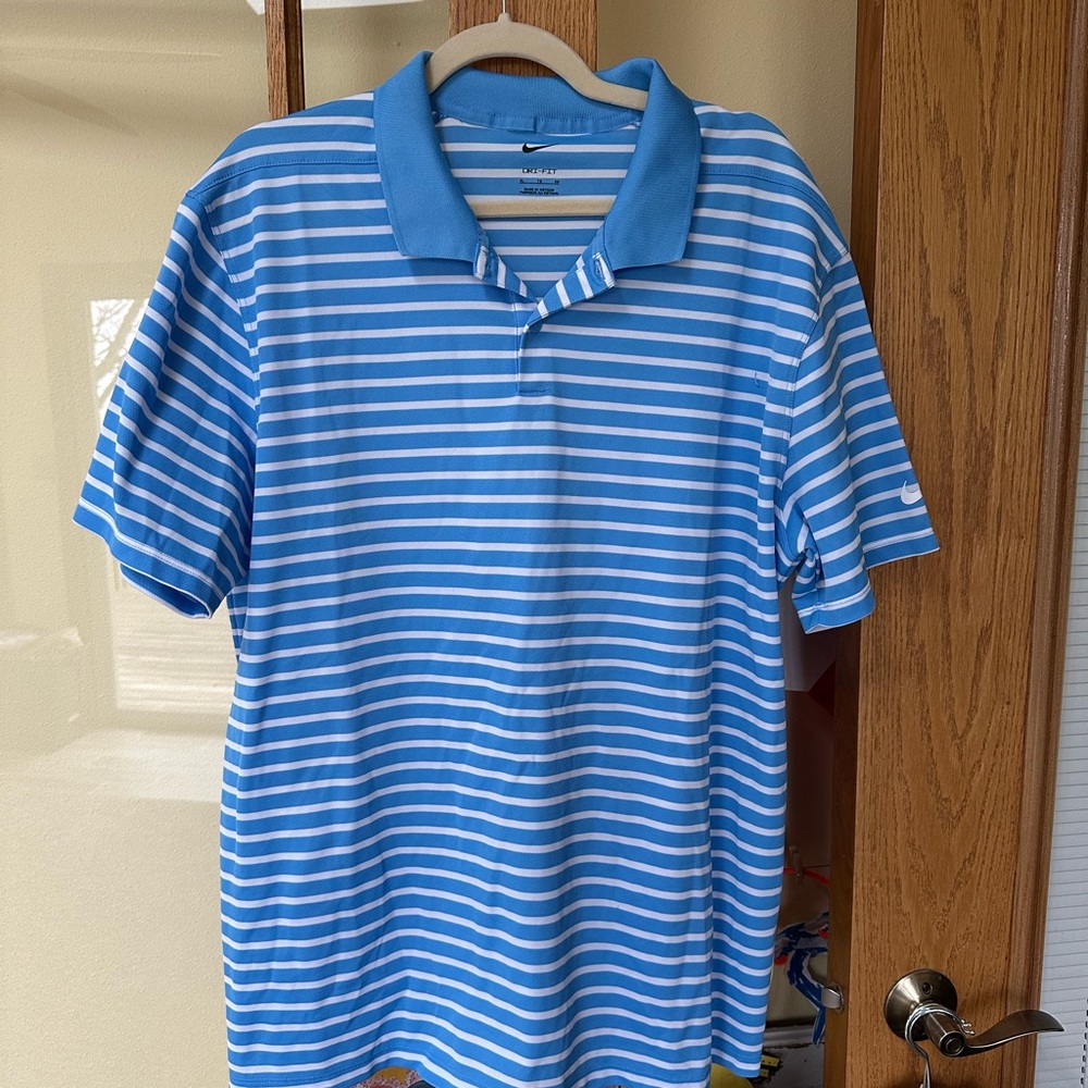 Nike Men's Blue Striped Polo Shirt